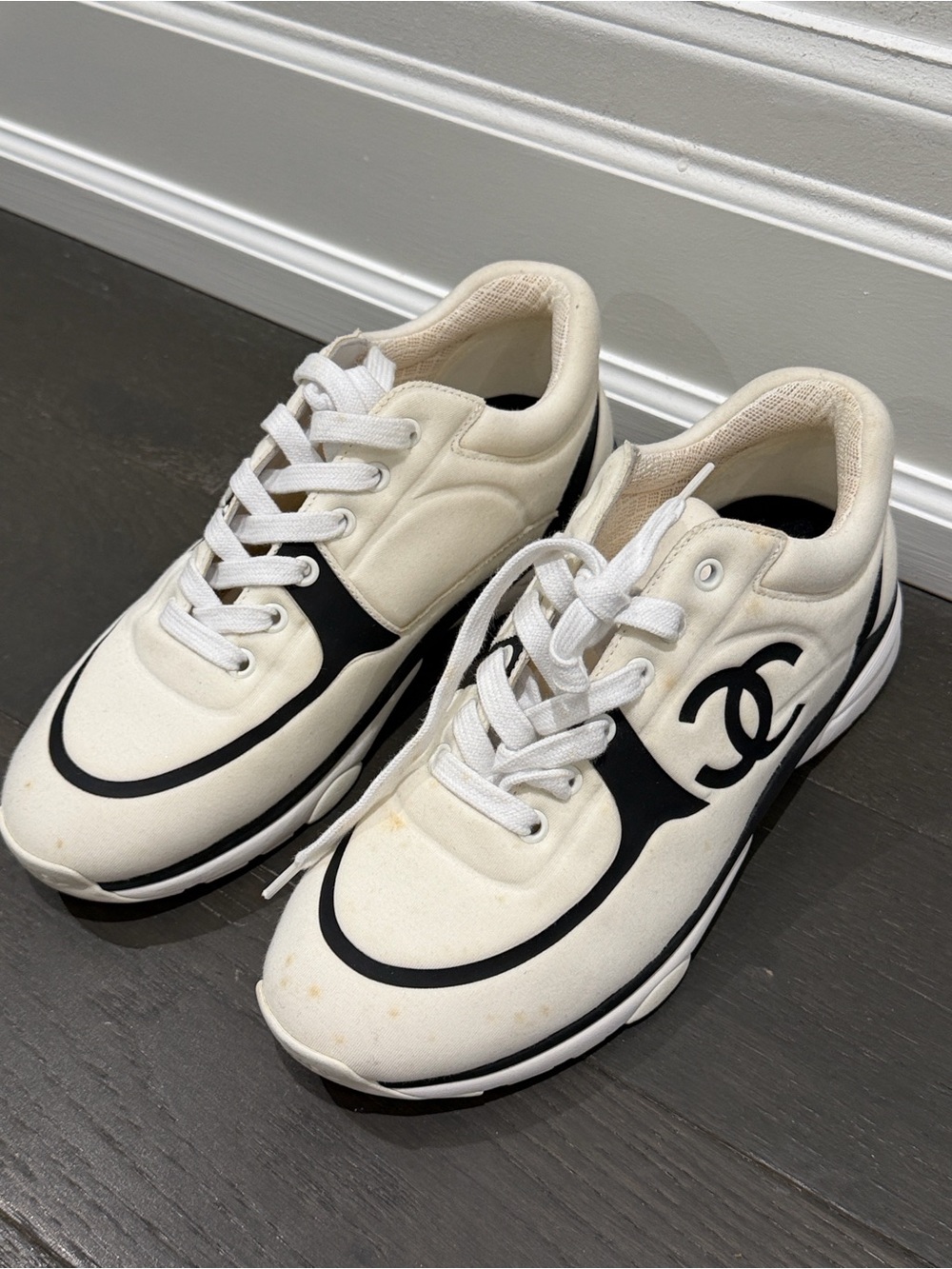 CHANEL Black and Ivory CC Logo Low-Top Sneakers